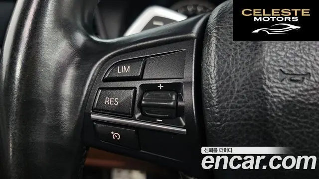 BMW Série 5 (F10) 550i xDrive 2013 — photo 17 sur 26
