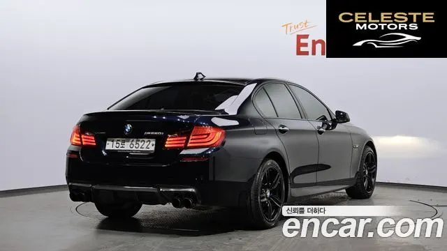 BMW Série 5 (F10) 550i xDrive 2013 — photo 2 sur 26