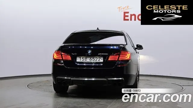 BMW Série 5 (F10) 550i xDrive 2013 — photo 4 sur 26