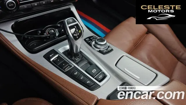 BMW Série 5 (F10) 550i xDrive 2013 — photo 9 sur 26
