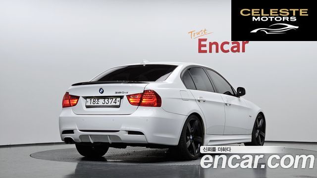 BMW Série 3 (E90) 320d Berline Noir Blanc 2011 — photo 2 sur 20