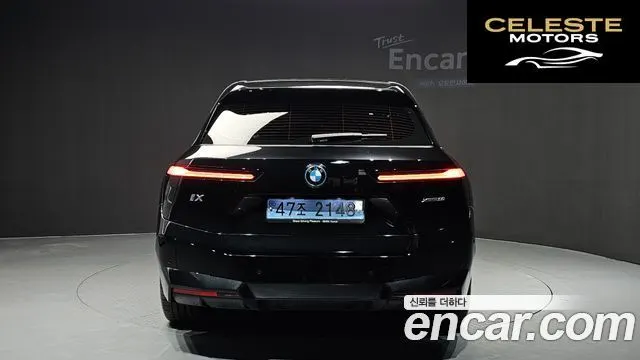 BMW iX xDrive50 Sport Plus 2023 — photo 4 sur 26