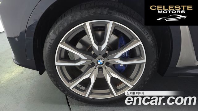 BMW X7 (G07) M50i 6 places 2020 — photo 4 sur 20