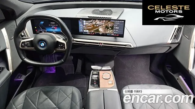 BMW iX xDrive50 Sport Plus 2023 — photo 7 sur 26