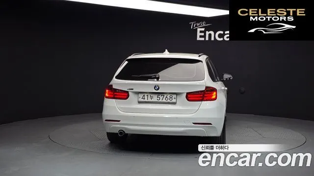 BMW Série 3 (F30) 320d xDrive Touring 2014 — photo 4 sur 20