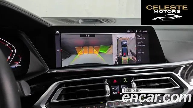 BMW X7 (G07) M50i 6 places 2020 — photo 15 sur 26