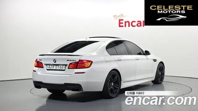 BMW Série 5 (F10) M550d xDrive Aéro Dynamic 2015 — photo 2 sur 20