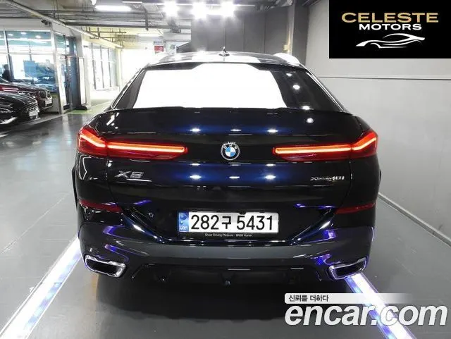 BMW X6 (G06) xDrive40i M Sport 2023 — photo 4 sur 26