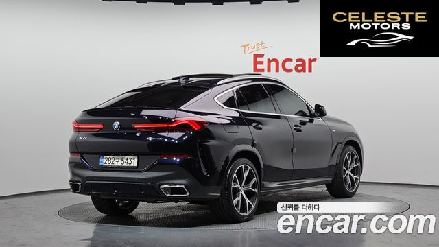 BMW X6 (G06) xDrive40i M Sport 2023 — photo 2 sur 26