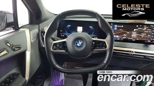 BMW iX xDrive50 Sport Plus 2023 — photo 13 sur 20