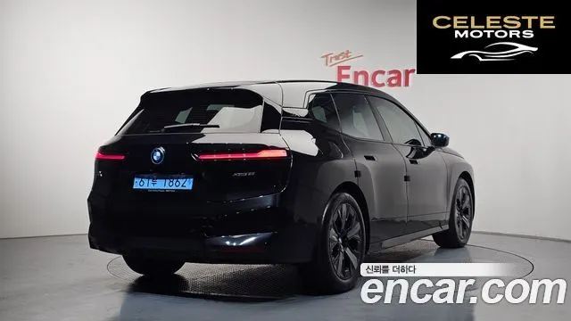 BMW iX xDrive50 Sport Plus 2023 — photo 2 sur 20