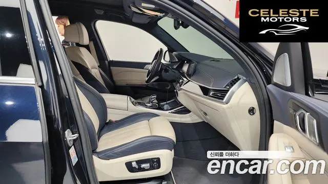 BMW X7 (G07) M50i 6 places 2021 — photo 11 sur 26