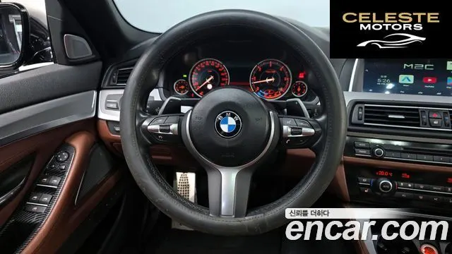 BMW Série 5 (F10) M550d xDrive 2014 — photo 13 sur 20