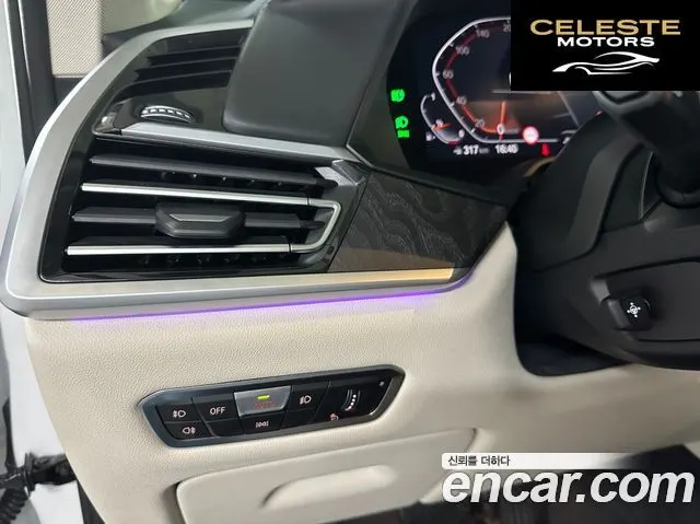 BMW X7 (G07) xDrive 40i Design Pure Excellence 6 places 2021 — photo 13 sur 26