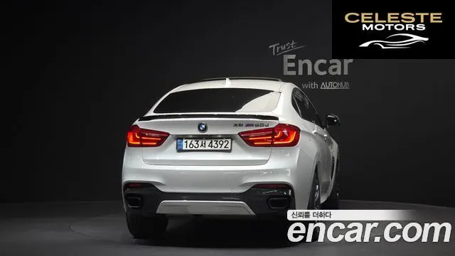 BMW X6 (F16) M50d 2015 — photo 4 sur 20