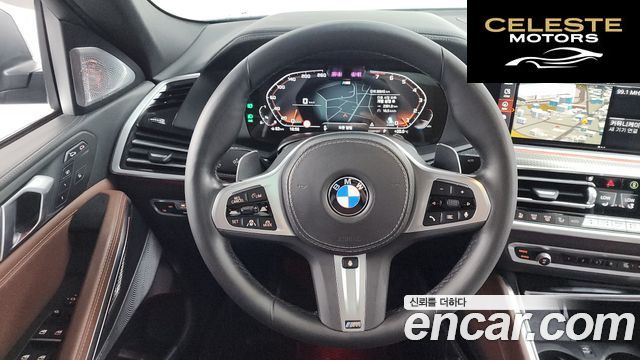 BMW X6 (G06) xDrive40i M Sport 2022 — photo 18 sur 37
