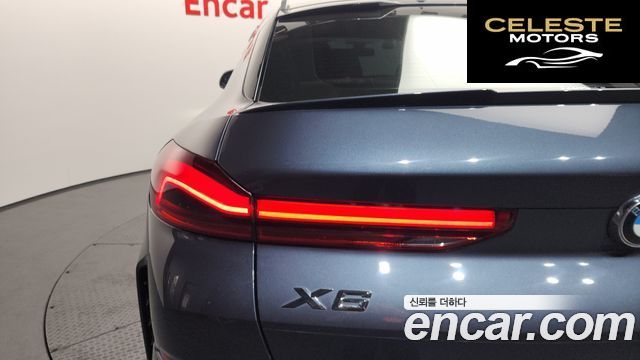 BMW X6 (G06) xDrive40i M Sport 2022 — photo 9 sur 37