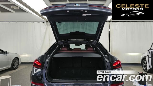 BMW X6 (G06) xDrive40i M Sport 2021 — photo 26 sur 36