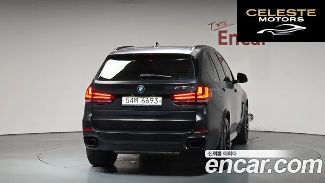 BMW X5 (F15) xDrive M50d 2014 — photo 4 sur 35