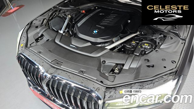 BMW Série 7 (G11) 740i Design Pure Excellence 2021 — photo 6 sur 35