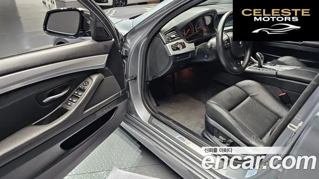 BMW Série 5 (F10) 550i xDrive 2012 — photo 10 sur 20