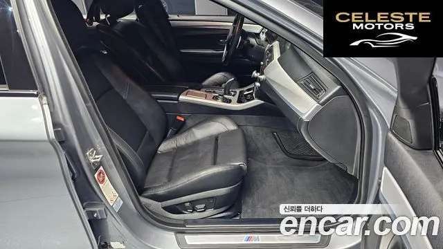 BMW Série 5 (F10) 550i xDrive 2012 — photo 11 sur 20