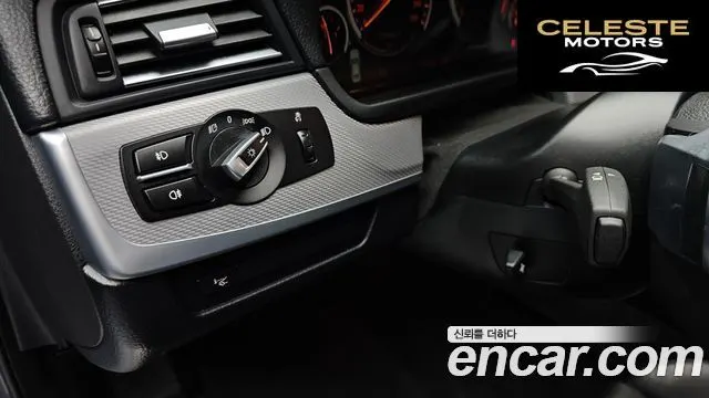 BMW Série 5 (F10) 550i xDrive 2012 — photo 13 sur 20