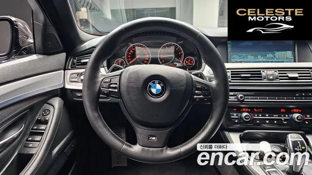 BMW Série 5 (F10) 550i xDrive 2012 — photo 14 sur 20
