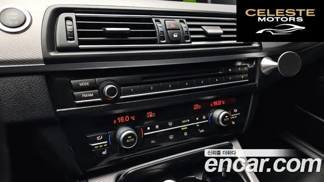 BMW Série 5 (F10) 550i xDrive 2012 — photo 17 sur 20