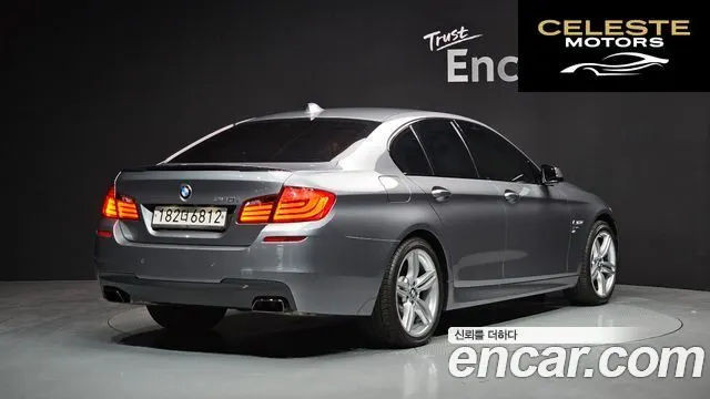 BMW Série 5 (F10) 550i xDrive 2012 — photo 2 sur 20