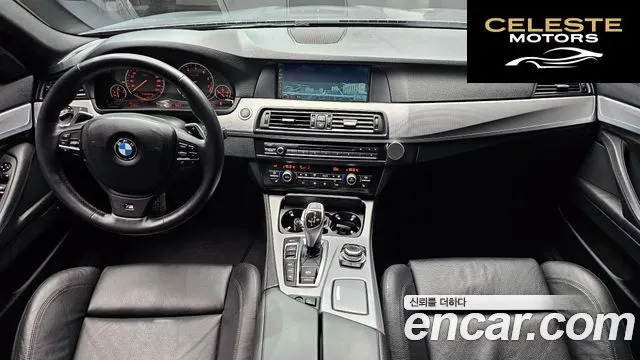 BMW Série 5 (F10) 550i xDrive 2012 — photo 7 sur 20