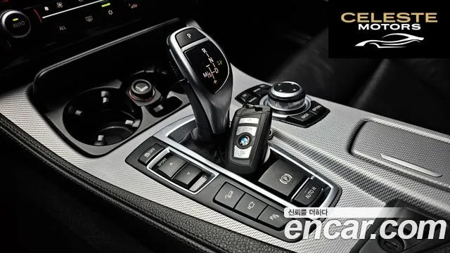 BMW Série 5 (F10) 550i xDrive 2012 — photo 9 sur 20