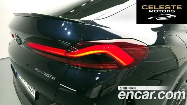 BMW X6 (G06) xDrive30d M Sport 2020 — photo 9 sur 31