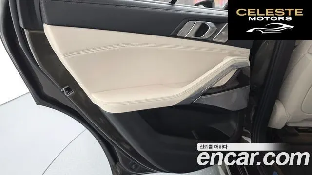 BMW X6 (G06) M50i 2022 — photo 15 sur 34
