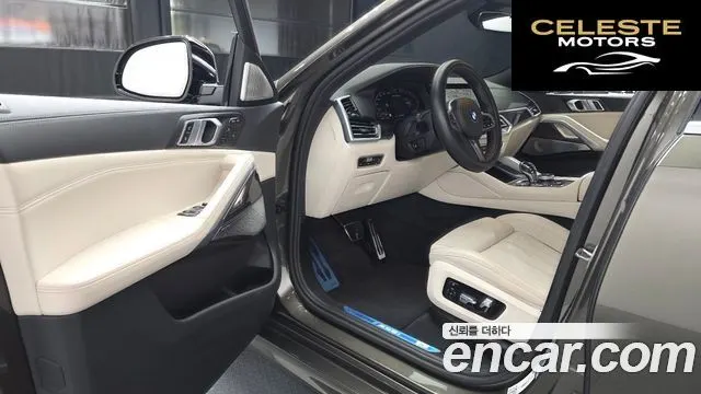 BMW X6 (G06) M50i 2022 — photo 13 sur 34
