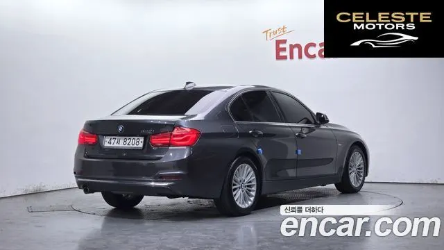 BMW Série 3 (F30) 320i Luxury 2017 — photo 1 sur 34