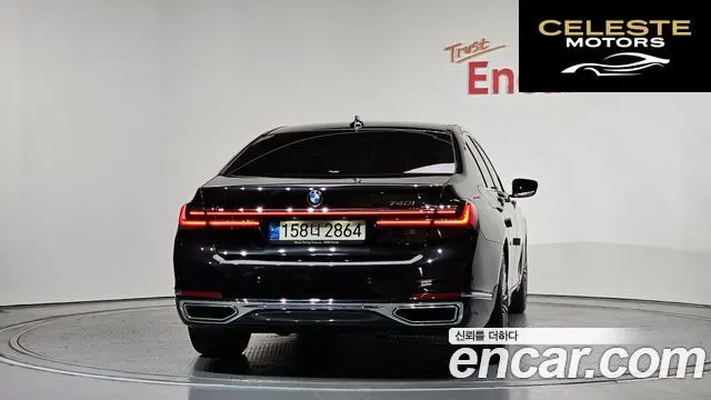 BMW Série 7 (G11) 740i Design Pure Excellence 2021 — photo 4 sur 34