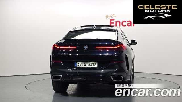 BMW X6 (G06) xDrive30d M Sport 2021 — photo 4 sur 38