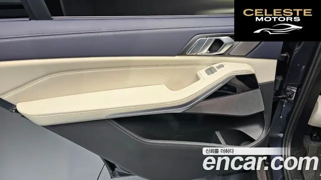BMW X7 (G07) M50i 6 places 2022 — photo 15 sur 33
