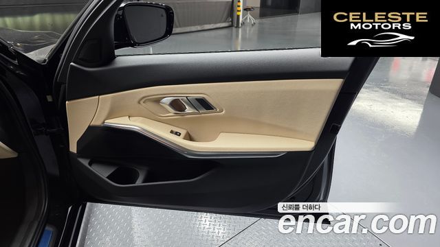 BMW Série 3 (G20) 320i 2023 — photo 14 sur 31