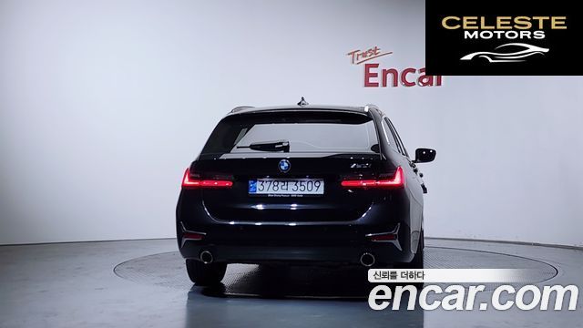 BMW Série 3 (G20) 320i Touring Luxury 2022 — photo 4 sur 31