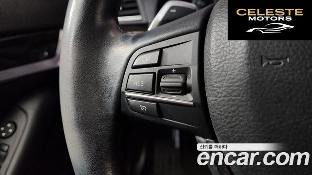 BMW Série 5 (F10) 528i xDrive 2014 — photo 23 sur 43