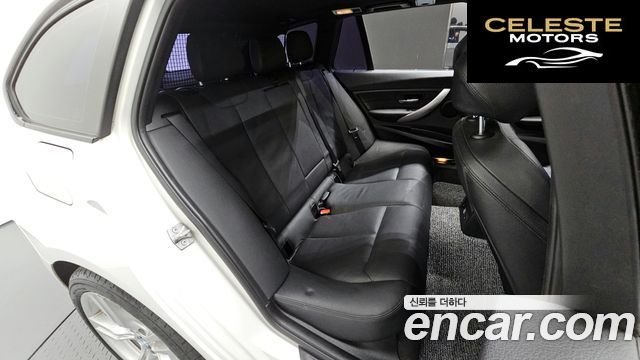 BMW Série 3 (F30) 320d xDrive Touring M Sport 2013 — photo 11 sur 20