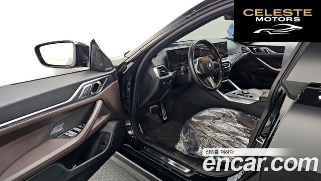 BMW i4 eDrive40 M Sport Pro 2024 — photo 13 sur 38