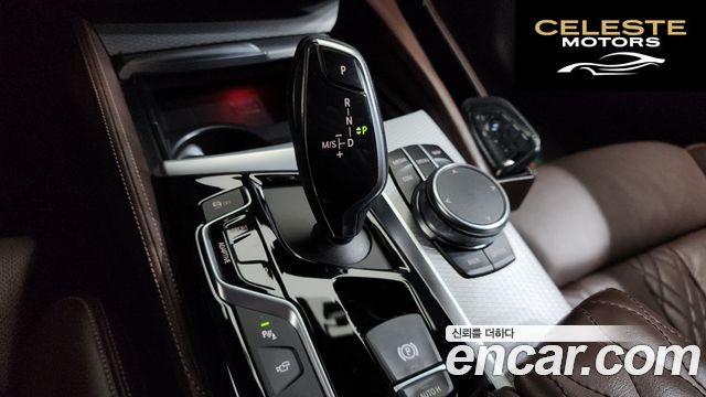 BMW Série 5 (G30) M550d xDrive 2018 — photo 12 sur 34