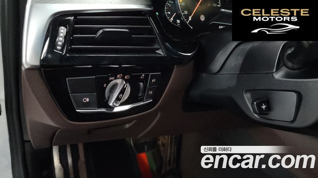 BMW Série 5 (G30) M550d xDrive 2018 — photo 29 sur 34
