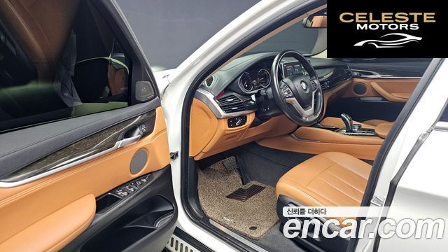 BMW X6 (F16) xDrive 30d 2018 — photo 13 sur 34