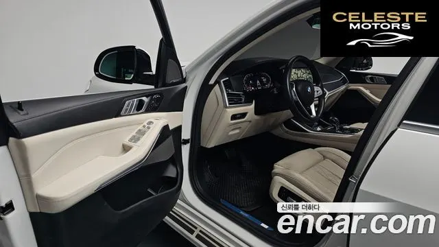 BMW X7 (G07) xDrive 40i Design Pure Excellence 6 places 2022 — photo 12 sur 33
