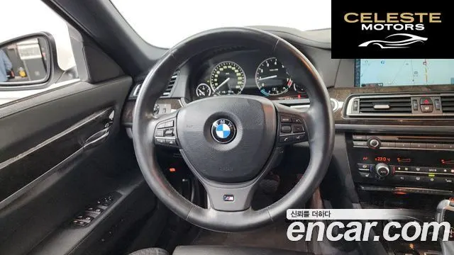 BMW Série 7 (F01) 740i M Sport 2012 — photo 13 sur 26