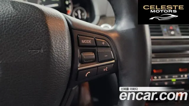 BMW Série 7 (F01) 740i M Sport 2012 — photo 17 sur 26